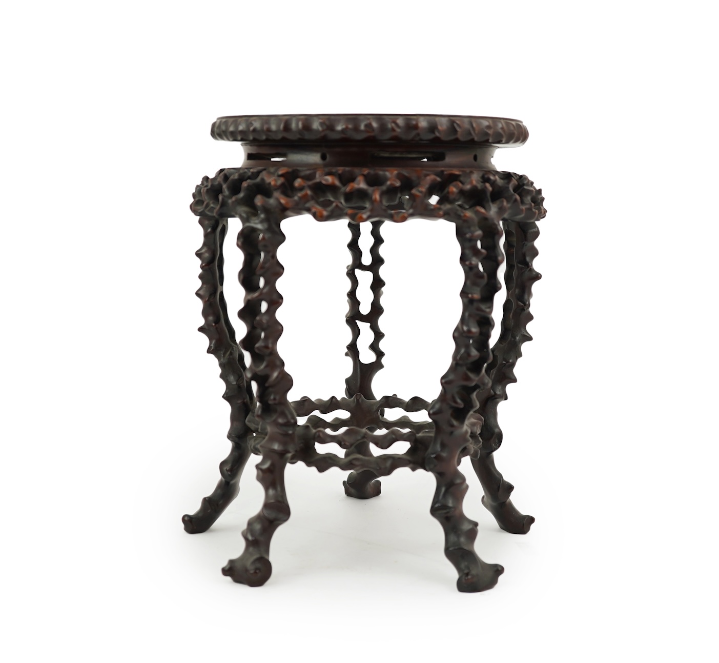 A Chinese hardwood scholar’s stand, carved in imitation of rootwood, early 20th century